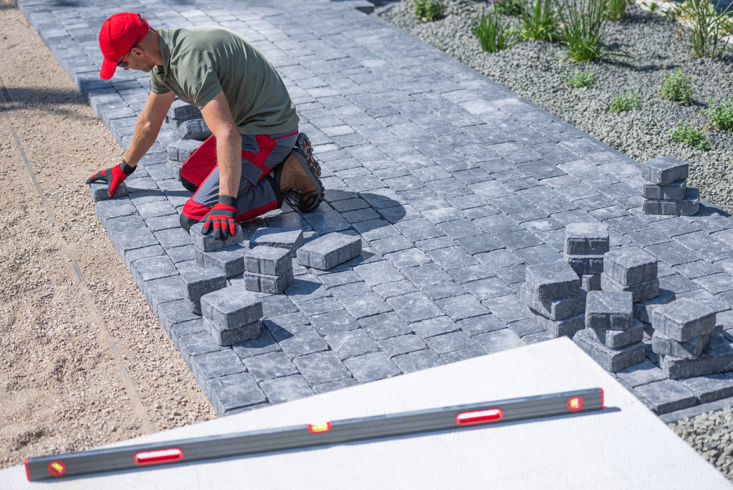 Paving a walkway with concrete pavers for Cape Town property maintenance