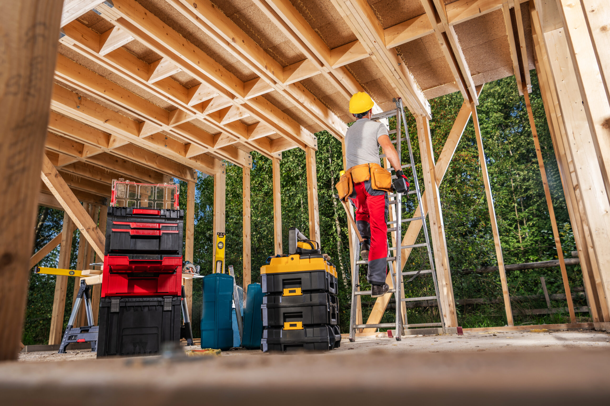 Construction contractor building wooden frame structure in Cape Town