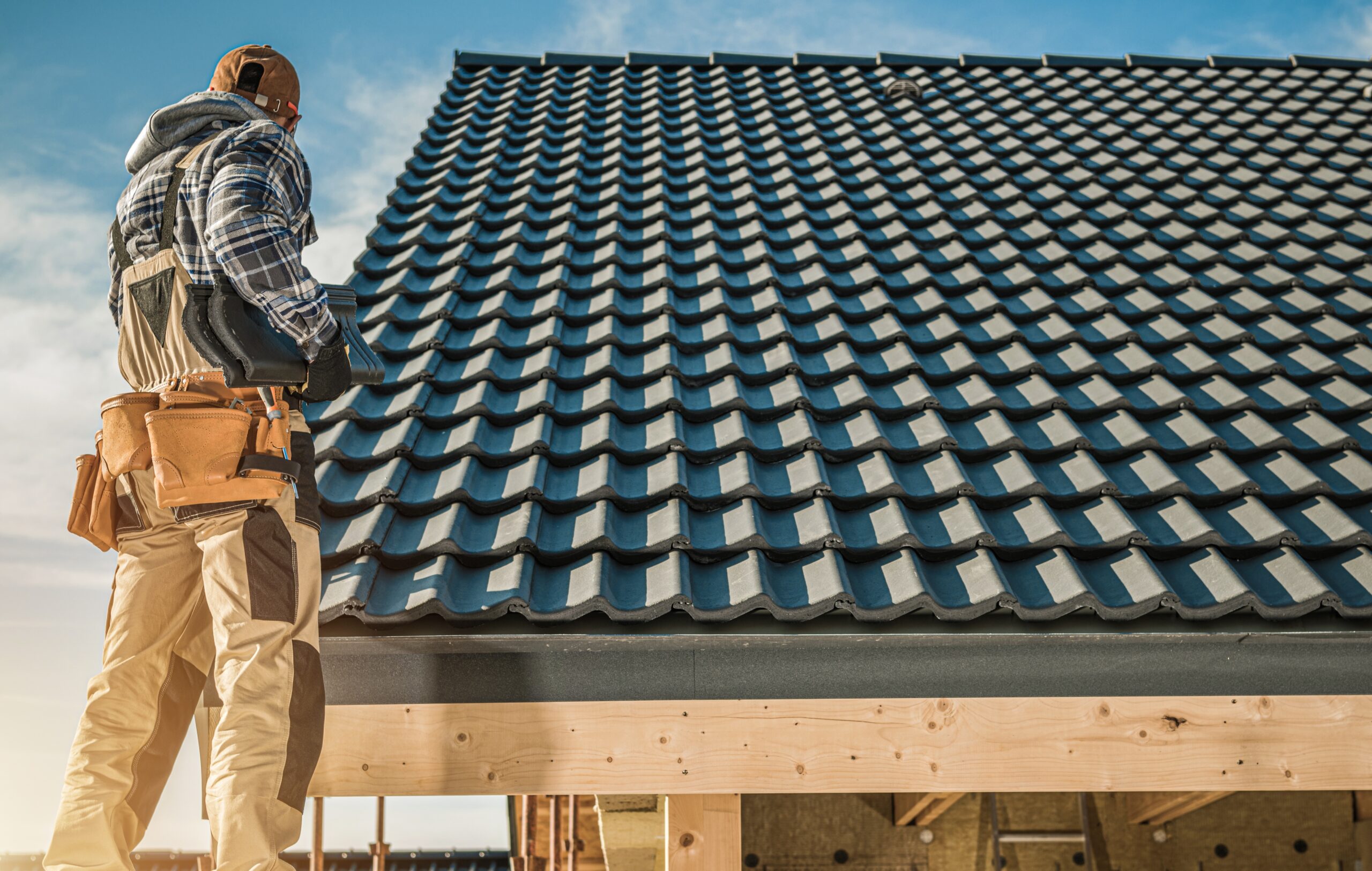 Cape Town roofing contractor installing roof tiles on residential prop